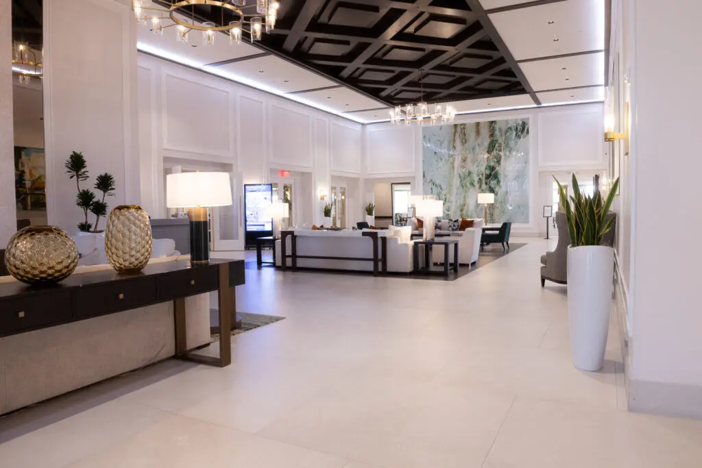 Luxurious lobby with expert tile flooring by Expert Tile & Flooring, Cooper City, Florida. Elegant seating and decor.