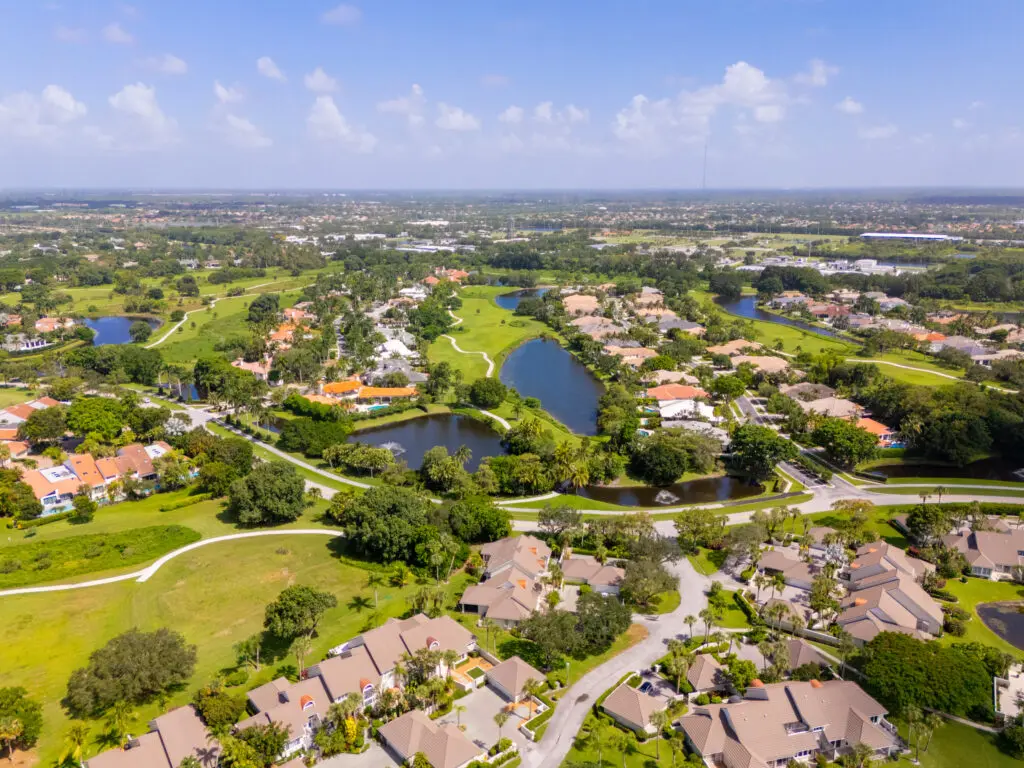 Aerial view of, Florida, lush greenery, homes, and waterways; ideal for Expert Tile & Flooring Tile Installation.