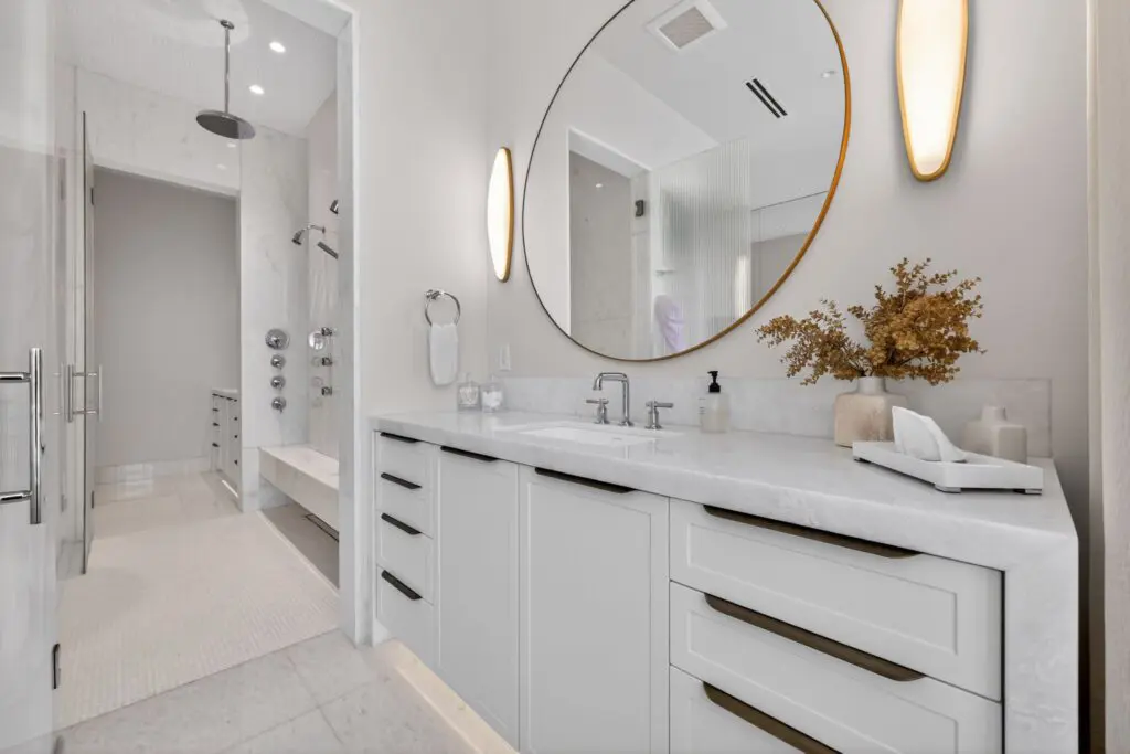 Modern bathroom featuring sleek marble tiles and stylish vanity by Expert Tile & Flooring Installation, Cooper City, Florida.